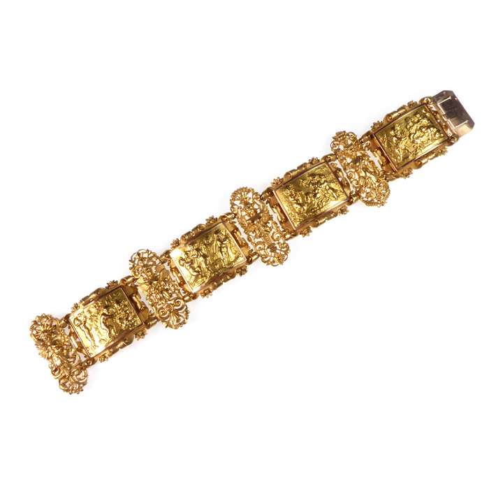 Gold embossed figural panel bracelet with putti and satyr